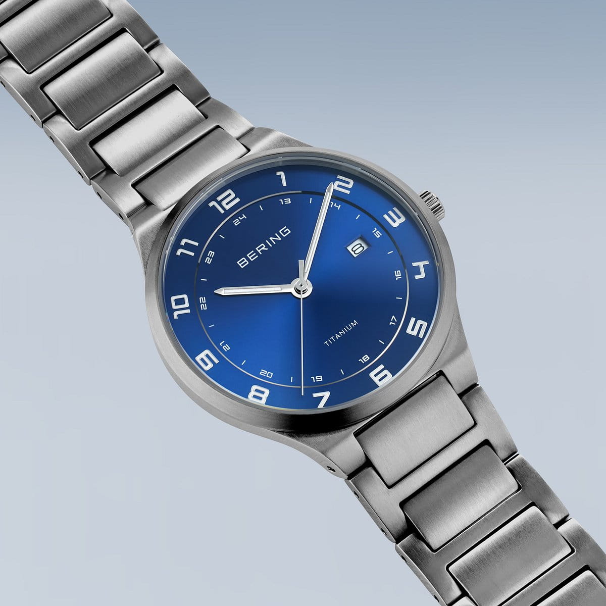 Bering Round Blue Dial Titanium Bracelet Watch 15139-707