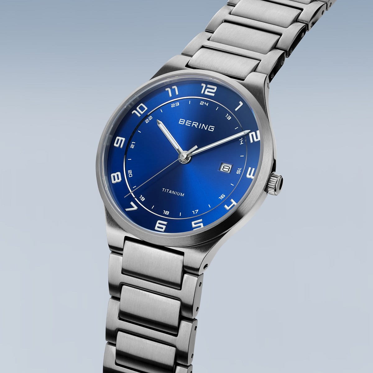 Bering Round Blue Dial Titanium Bracelet Watch 15139-707