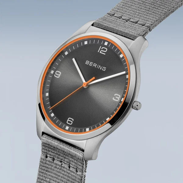 Bering Ultra Slim Grey And Orange Highlight Dial With Grey Nato Strap 18342-577