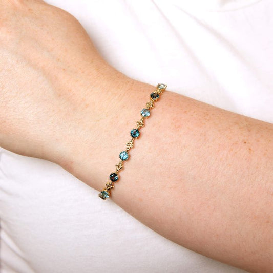 9ct Yellow Gold Dark and Light Blue Topaz Bracelet