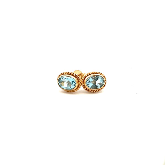 9ct Yellow Gold Blue Topaz Oval Stud Earrings