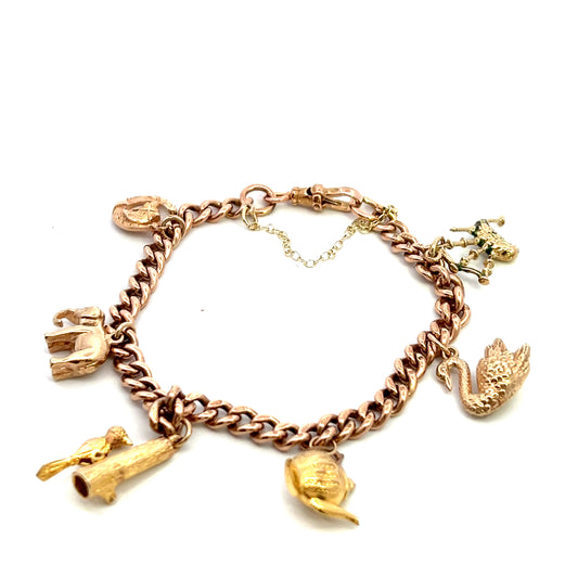 Pre-Owned 9ct Rose Gold Bracelet With Six Assorted Charms