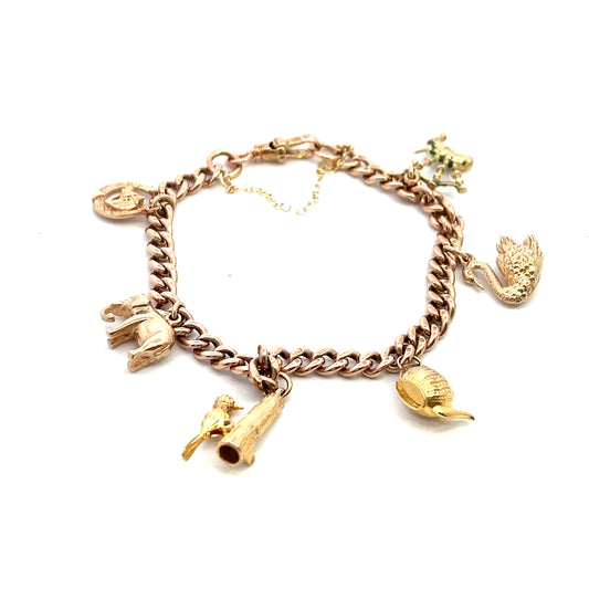 Pre-Owned 9ct Rose Gold Bracelet With Six Assorted Charms