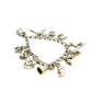 Pre Owned Silver Bracelet With Eleven Assorted Charms