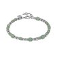 Bracelet with green beads and silver accents on a light gray background
