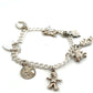 Pre-Owned Sterling Silver Double Curb Bracelet With 7 Assorted Charms