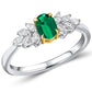 Platinum Oval Emerald And Marquise Diamond Ring