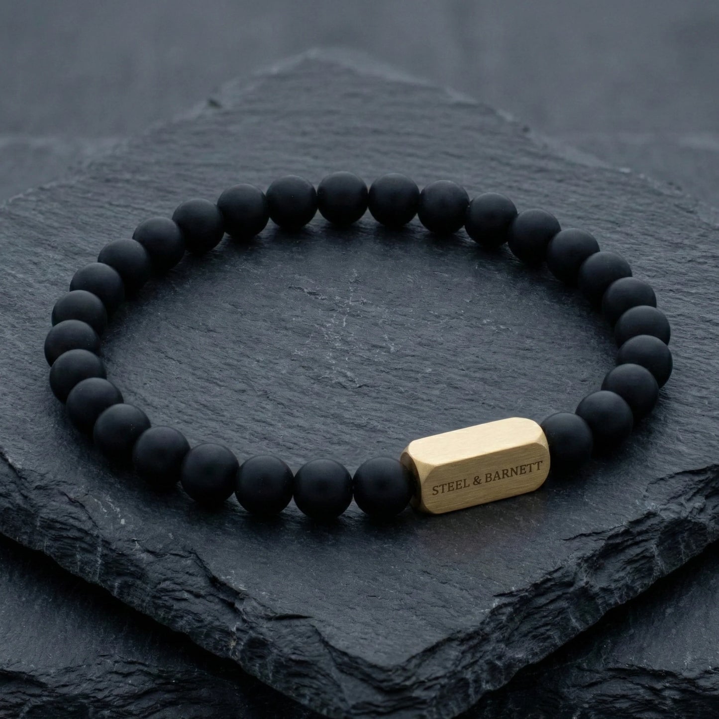 Steel & Barnett 6mm Onyx Beads Stretch Yellow Gold Plated Stainless Steel Bracelet Small