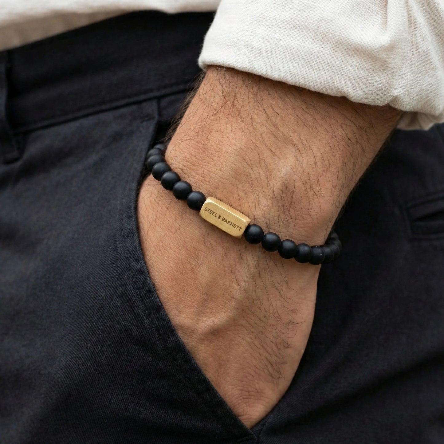 Steel & Barnett 6mm Onyx Beads Stretch Yellow Gold Plated Stainless Steel Bracelet Small