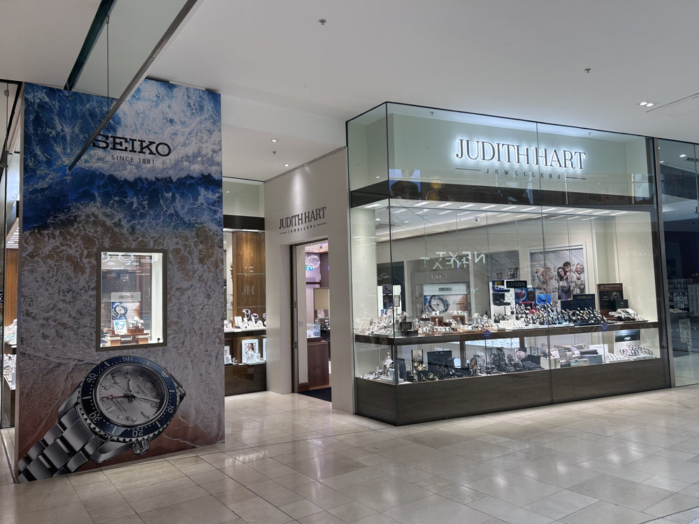 Mall interior with Seiko and Judith Hart store entrances.