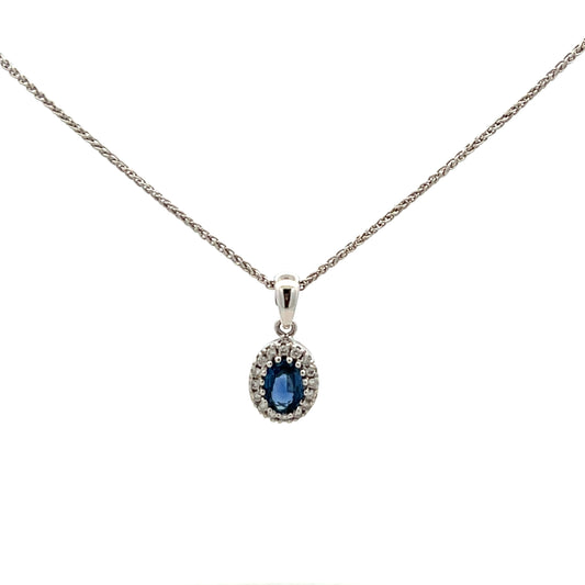 18ct White Gold Oval Sapphire And Diamond Cluster Pendant